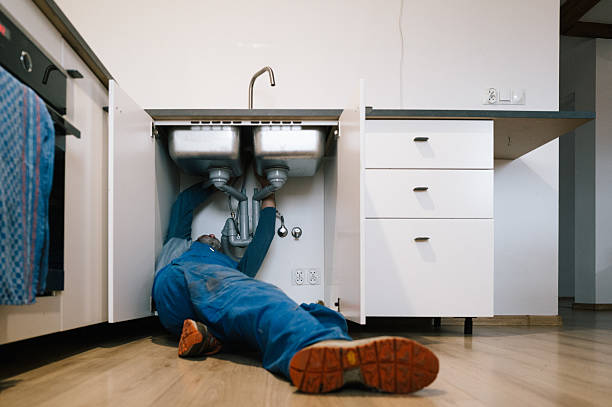 Professional Plumbing technician working in Norton, OH